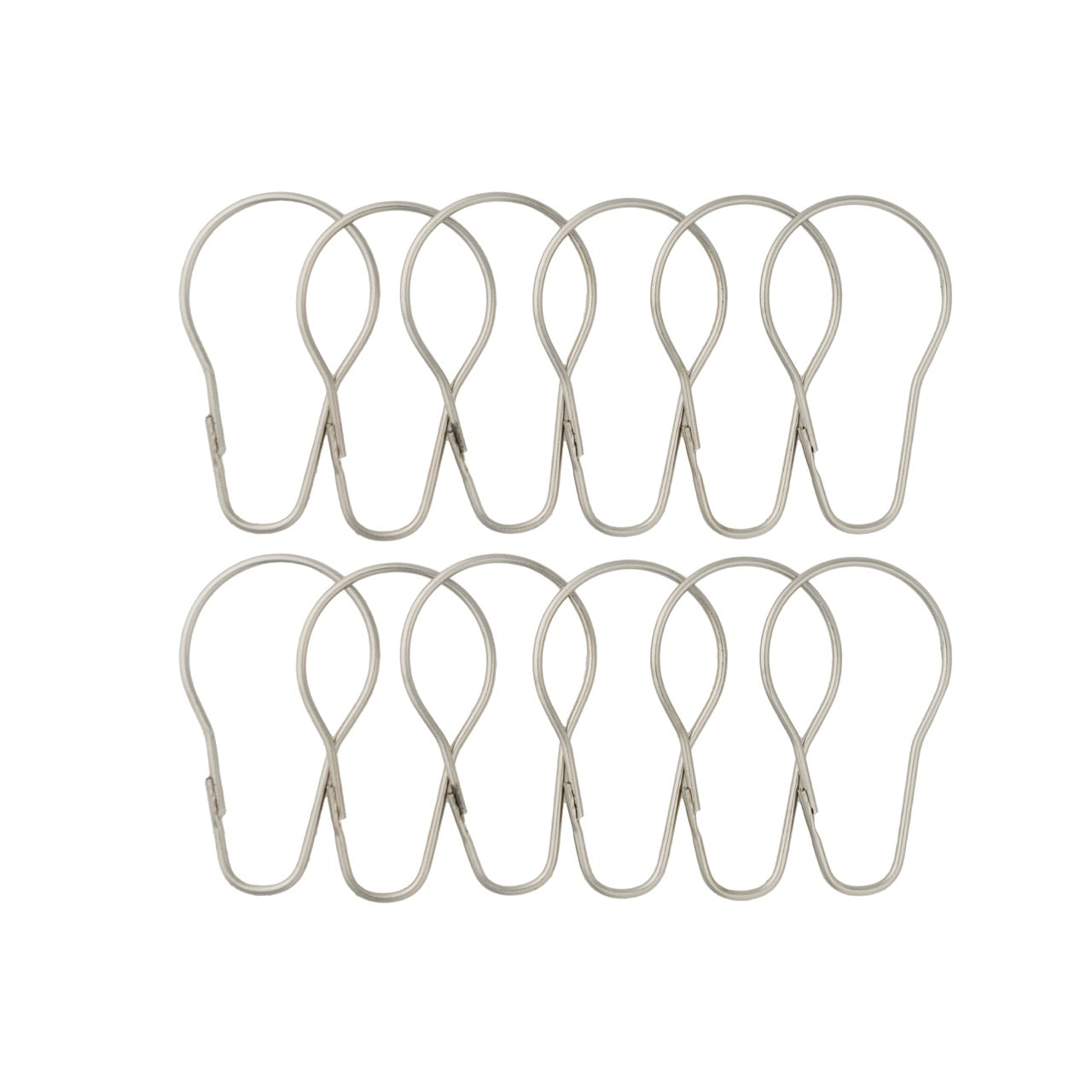 Twelve satin silver pear shaped rings laid out in two rows of six