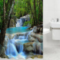 Stepped waterfalls spilling into turquoise pools between mossy rocks