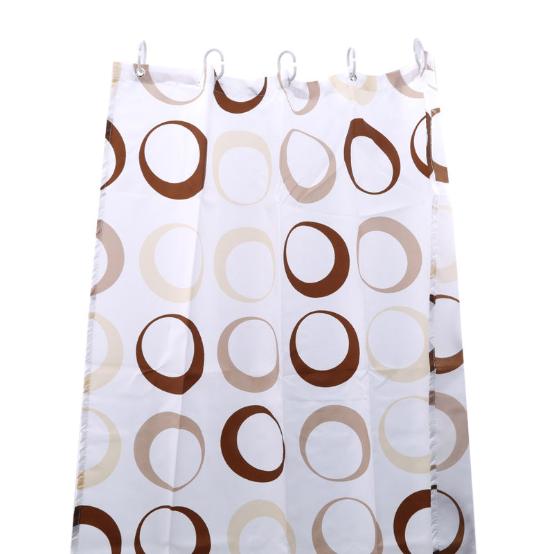 Close view of the concentric ring motif on cream fabric
