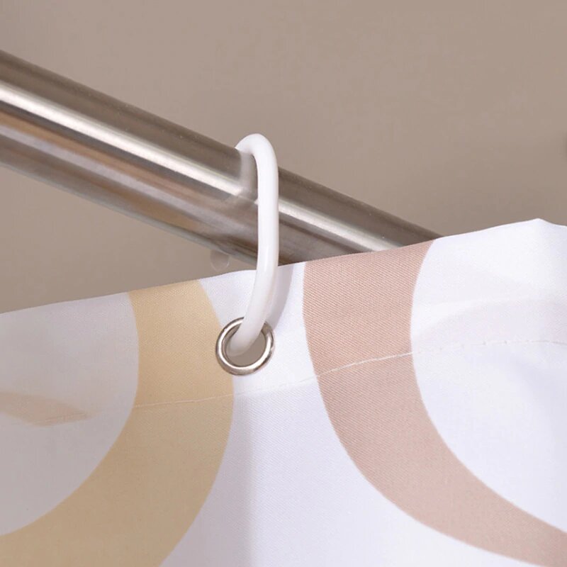 Narrow stall width panel hanging beside a shower tray