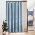 Plain blue grey panel with fine vertical ribs woven into the cloth