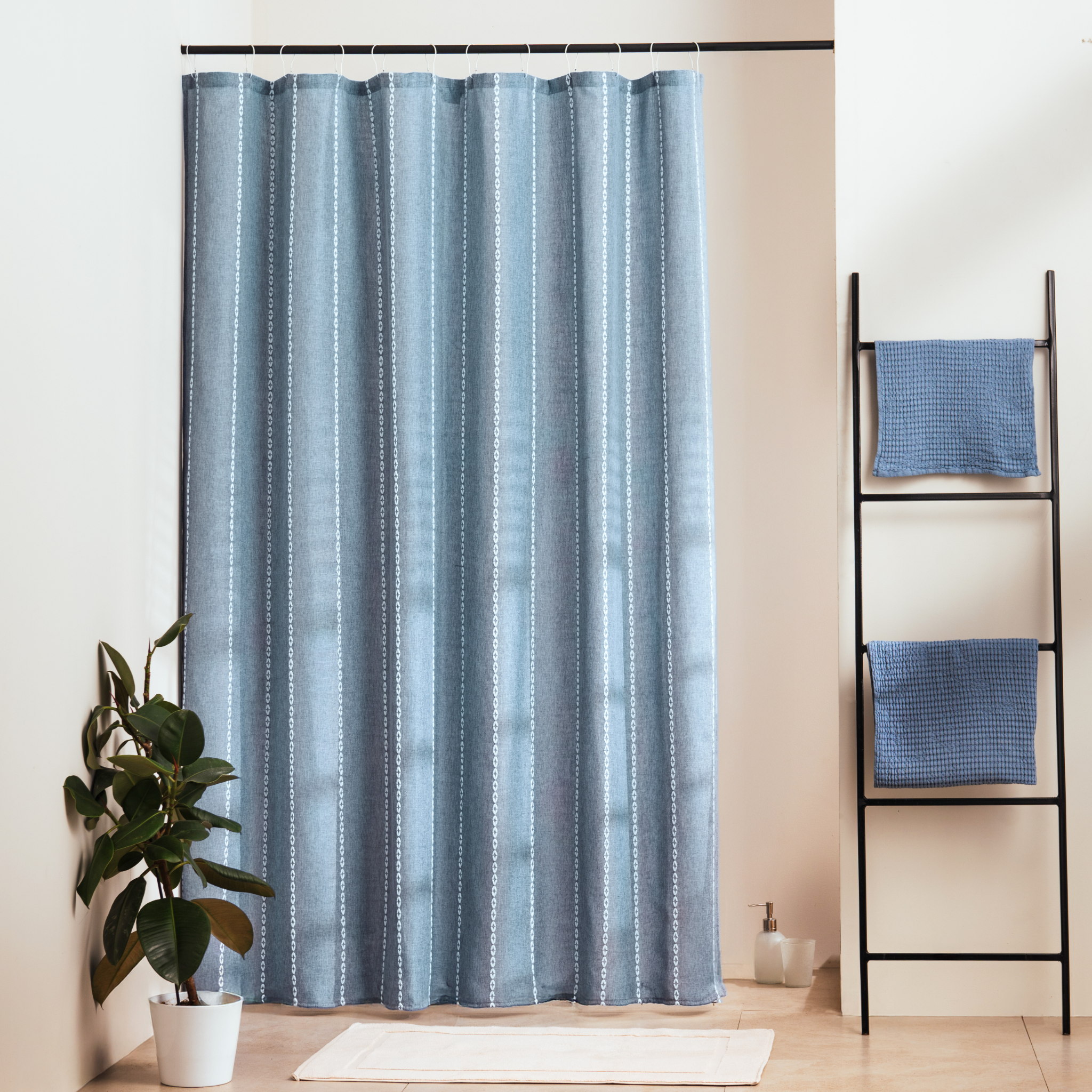 Plain blue grey panel with fine vertical ribs woven into the cloth