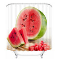 Halved watermelon on a board with red fleshed slices against clean white