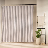 Fine even black stripes running vertically on an off-white panel