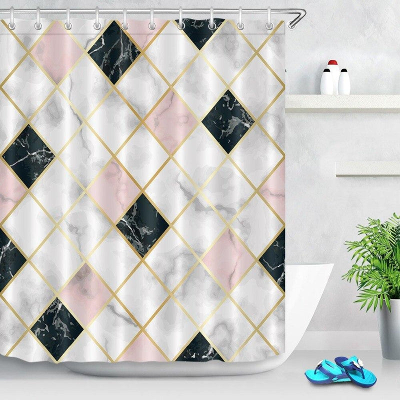 Diamonds of white black and powder pink marble separated by fine gold lines