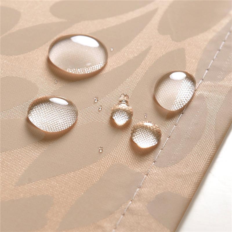Close detail of the smooth taupe fabric surface with no print