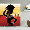 Black silhouette of a woman carrying a basket against a burnt orange sunset