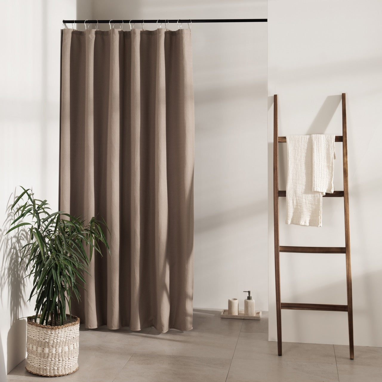 Plain mocha taupe panel with a fine waffle weave in the folds