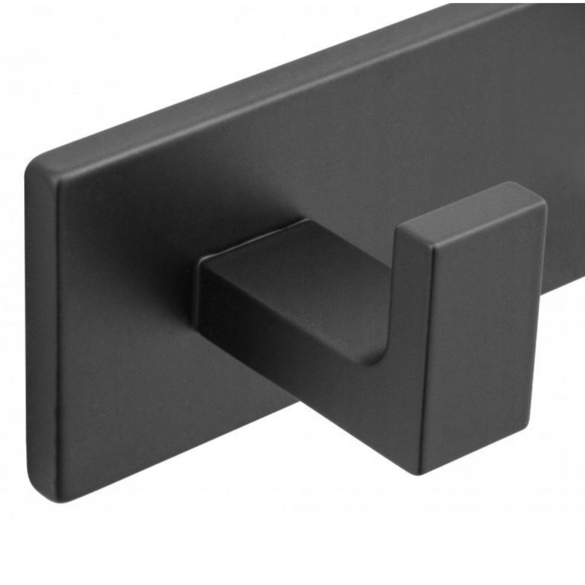 Five hook rail holding towels and a robe against the bathroom wall