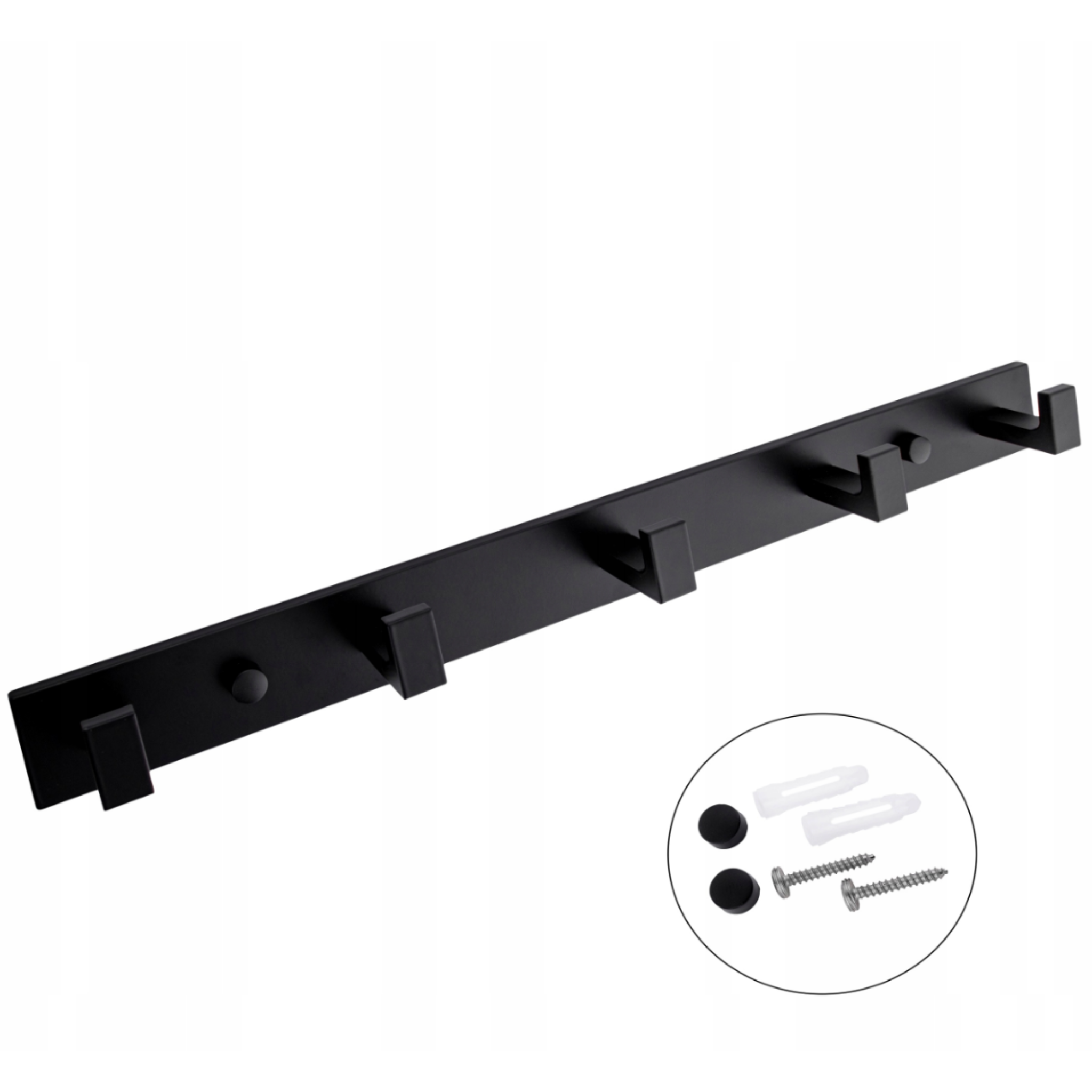 Black towel rail styled in a modern bathroom with pale tiling