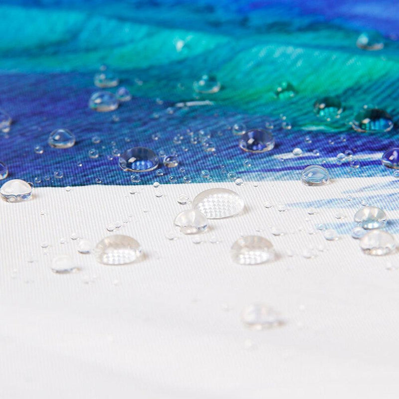 Full length turquoise wave curtain hanging beside a white bathtub