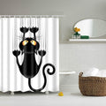 Black cat clinging by its claws to the top hem with its tail curled