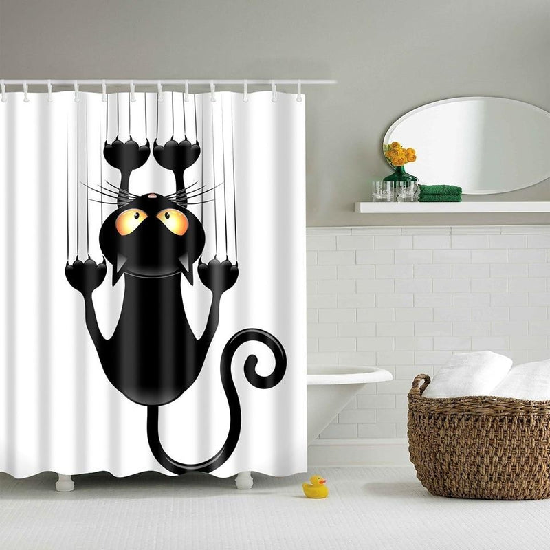 Black cat clinging by its claws to the top hem with its tail curled