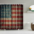 Weathered American flag painted across aged wooden planks with peeling paint