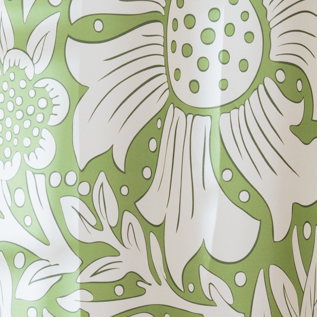 Weighted lower hem keeping the botanical panel hanging straight