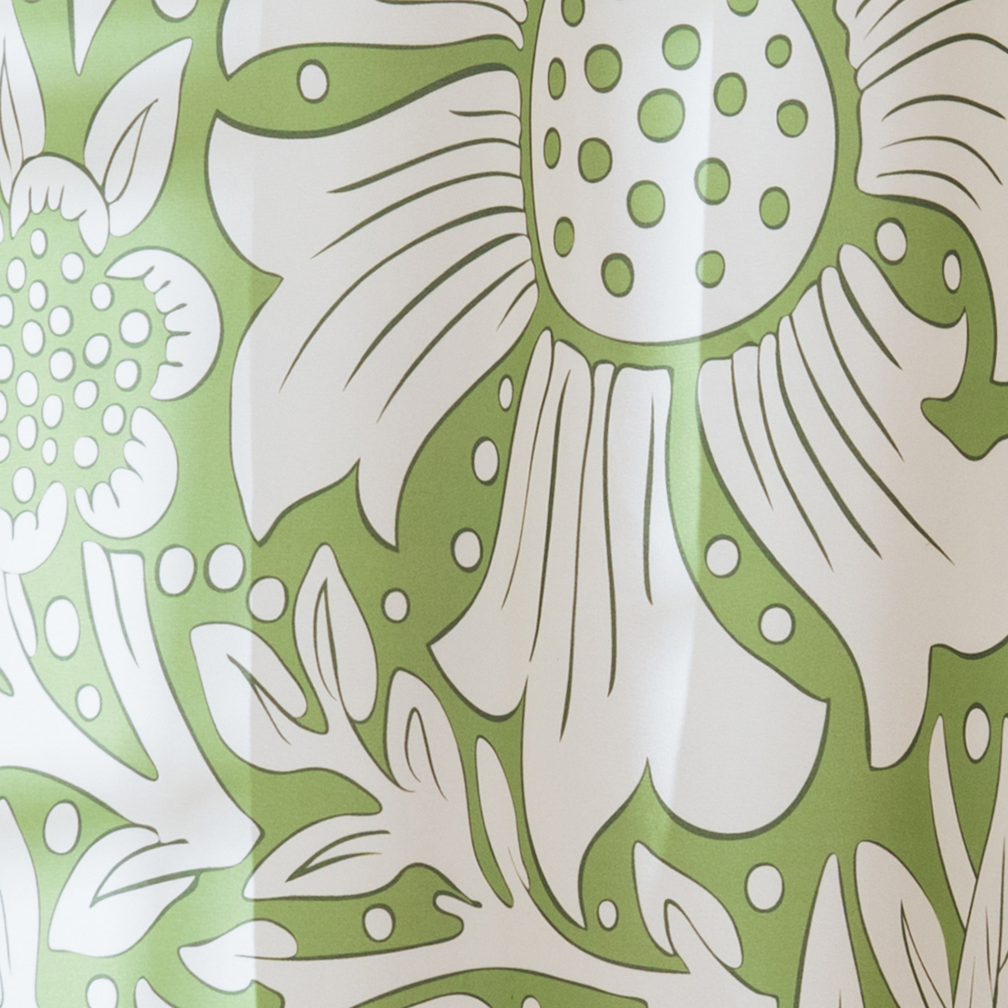 Weighted lower hem keeping the botanical panel hanging straight