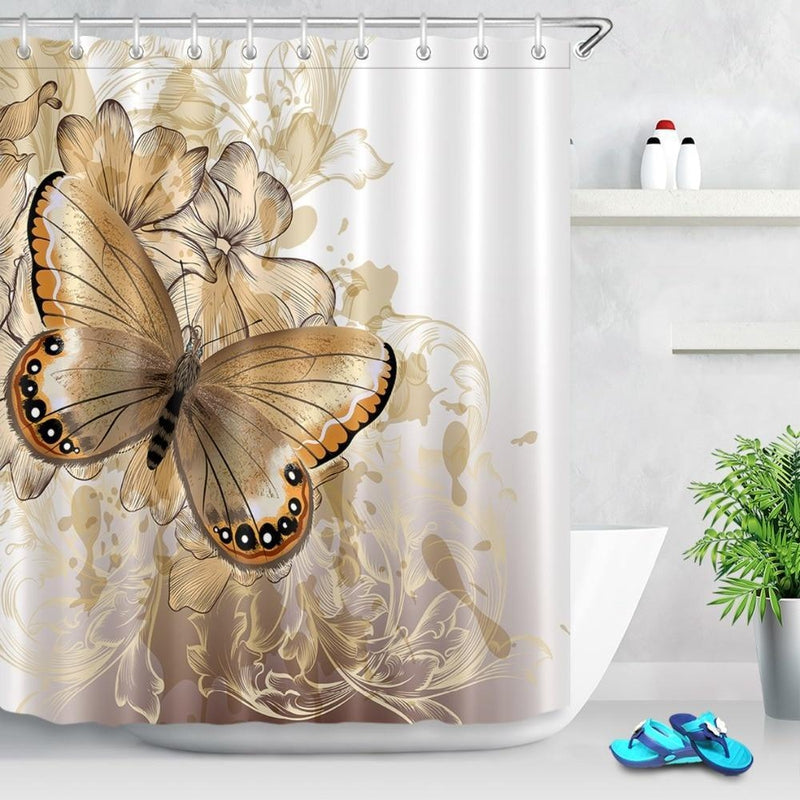 Large gold butterfly with fine floral scrollwork on an off-white ground