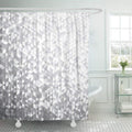 Small brushed silver and white triangles paved across the whole panel