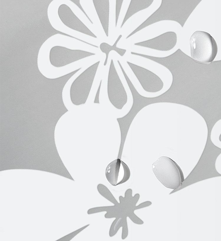 Close view of the white flower garland detail on frosted film