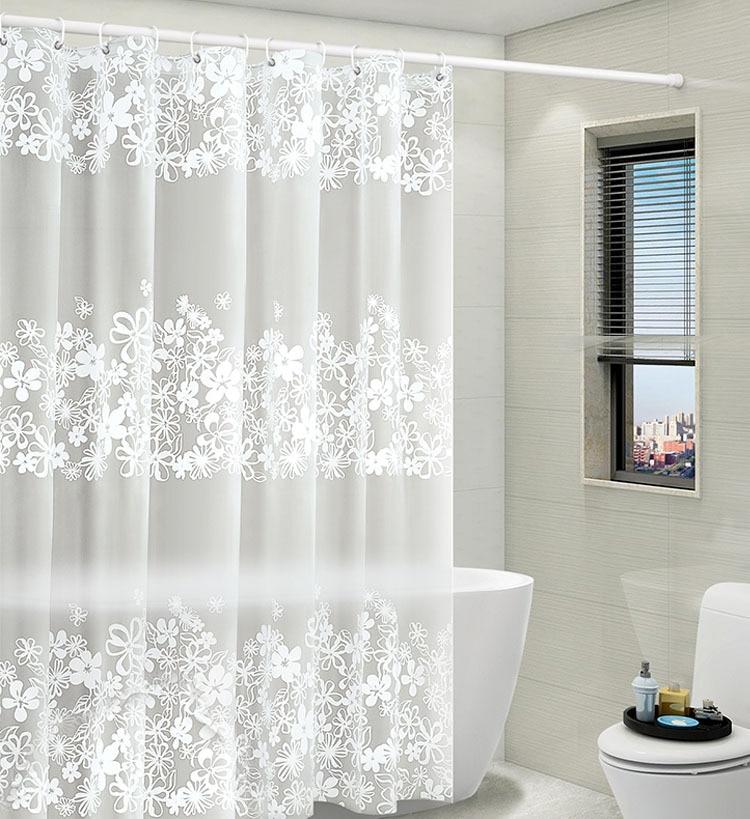 Frosted flower curtain hung across a shower opening