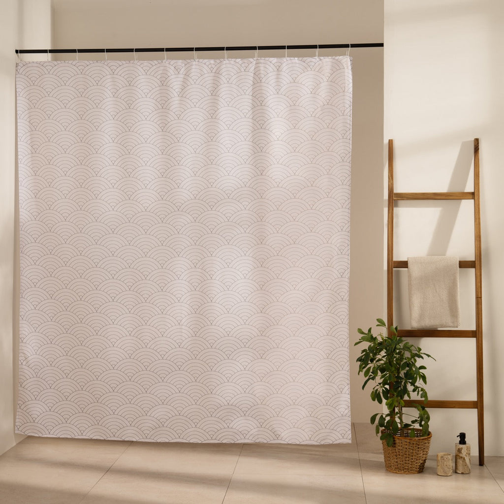 White surface covered in a repeating scale and wave relief texture