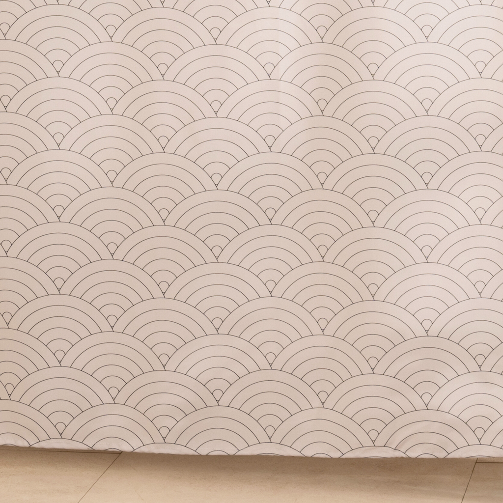 Full length textured white curtain hanging beside a glass screen
