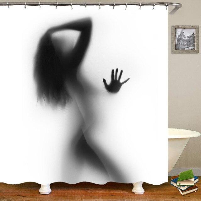 Cast shadow of a woman from behind with an open hand on white fabric