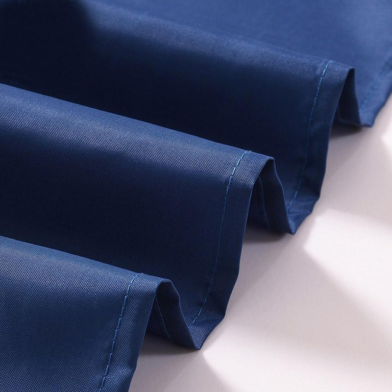 Upper hem of the navy panel with reinforced eyelets for shower hooks