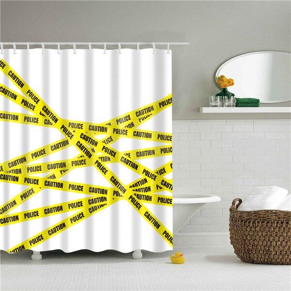 Yellow caution police tape with black lettering crossing a plain white background
